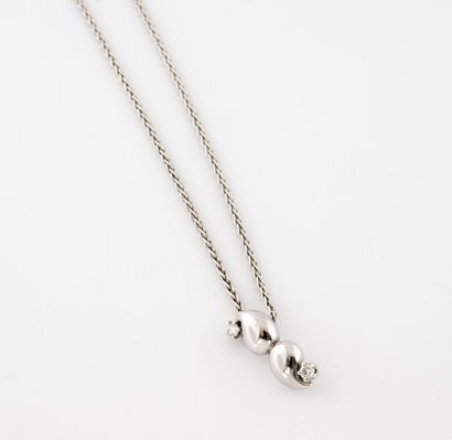 Necklace with braided chain and its pendant...