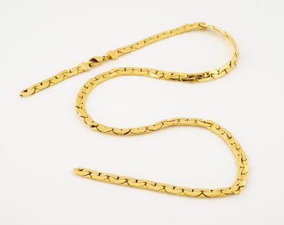 Collier en or jaune (750) à maille gourmette....