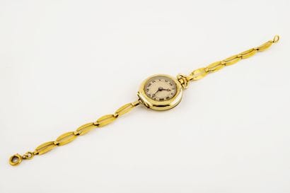 Montre bracelet de dame en or jaune (750)....
