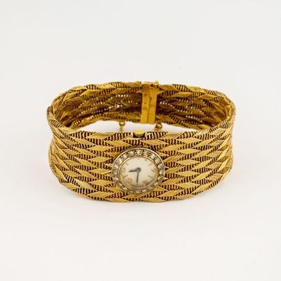 Montre bracelet de dame en or jaune (750).

Boîtier...