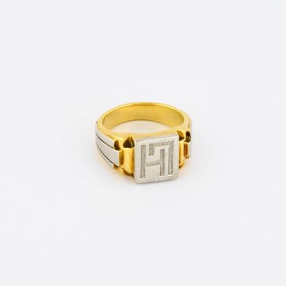 Chevalière en or jaune (750) et platine (850)...