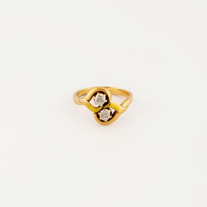 Bague toi et moi en ors jaune et gris (750).

Poids...