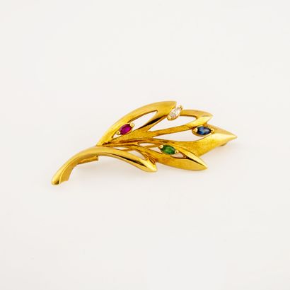 Yellow gold (750) spray brooch with a ruby,...