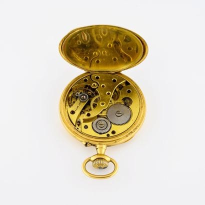 Montre de gousset en or jaune (750).

Couvercle...