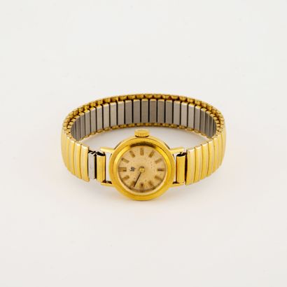 LIP
Montre bracelet de dame en or jaune (750).

Cadran...