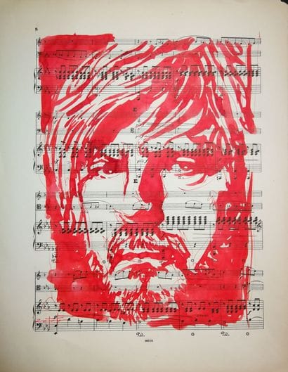 Portrait de Renaud à l'encre sur une partition...