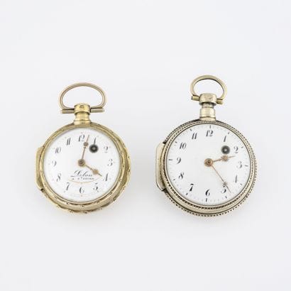Two pocket watches with cock:

- DEBON in...