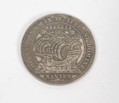 Token of the Commercial court of Nantes....