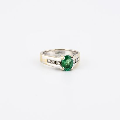 Rhodium-plated yellow gold ring centered...
