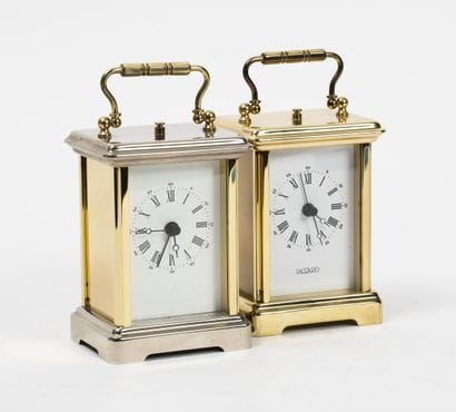 JACCARD 
Two officer's clocks in gilt or...