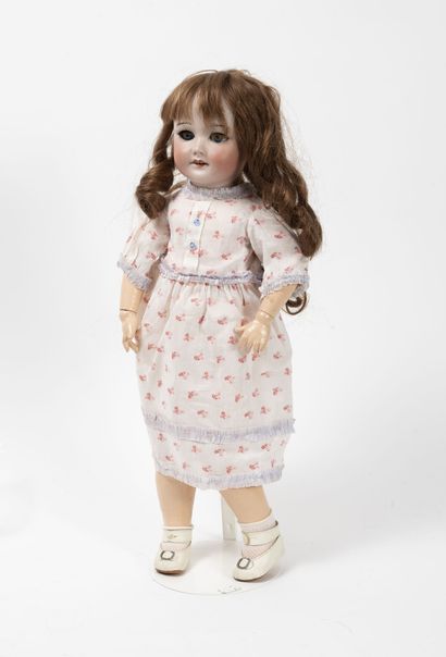 SFBJ
Doll, porcelain head marked in hollow...