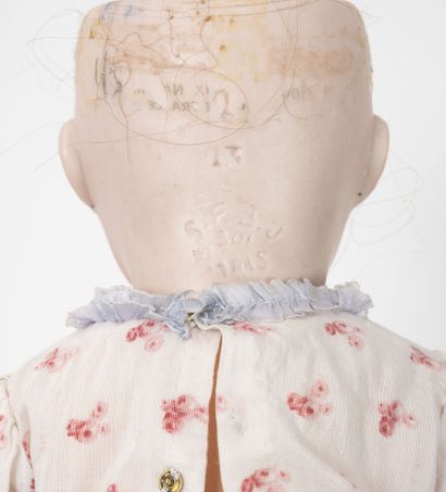 SFBJ
Doll, porcelain head marked in hollow...