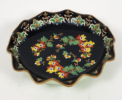 LONGWY
Earthenware dish enamelled polychrome...