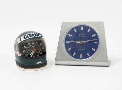 TAG HEUER
Alarm clock featuring a motorcycle...