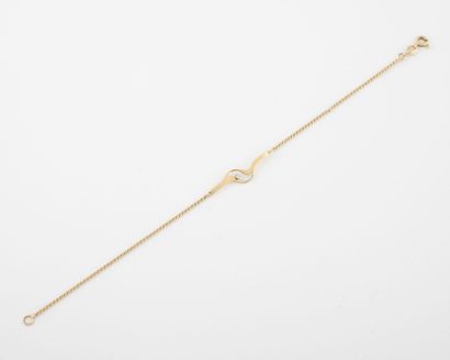 Yellow gold bracelet (585) set with a faceted...