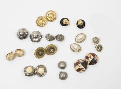 Eleven pairs of fancy ear clips in metal,...