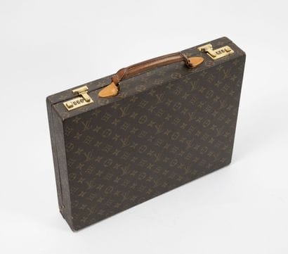 LOUIS VUITTON
Hard case in Monogram canvas...