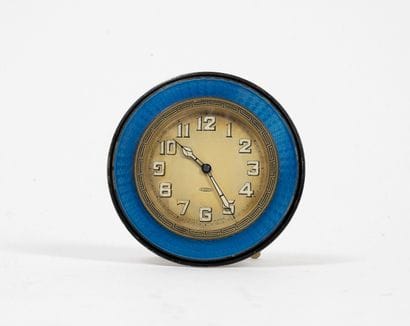 Clock 8 days in gilded metal, round shape....