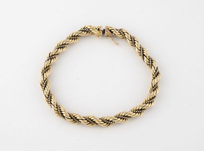 Yellow gold bracelet (750) with a rope link...