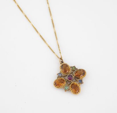 Yellow gold (575) necklace holding a yellow...