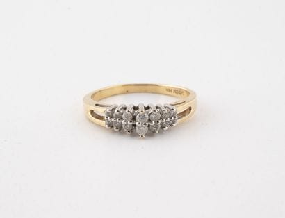 Yellow gold ring (585) set with faceted white...
