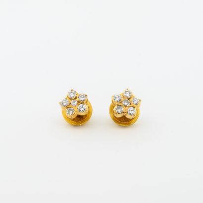 Pair of flower-shaped earrings in yellow...