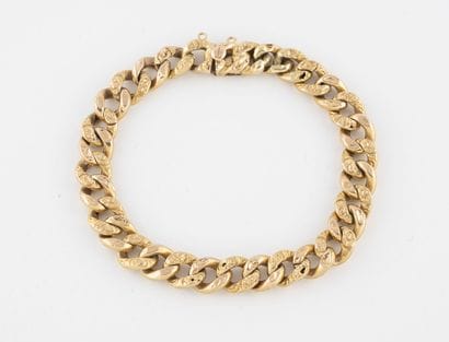 Bracelet en or jaune (750) à maille gourmette...