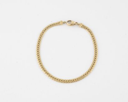 Bracelet in yellow gold (750) with flattened...