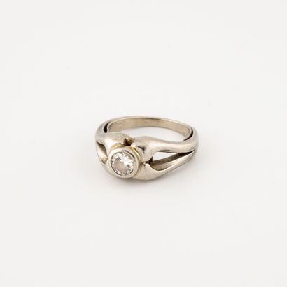 Platinum (850) ring centered with a close-set...