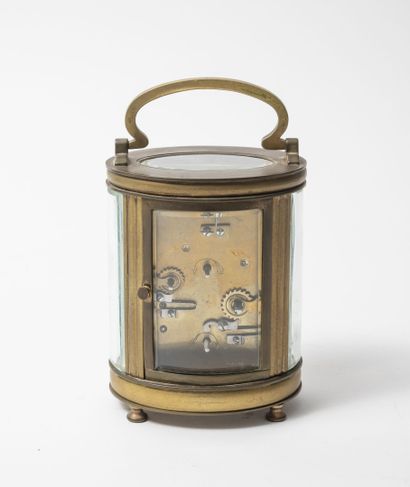 Officer's clock with gilt brass cage, oval...