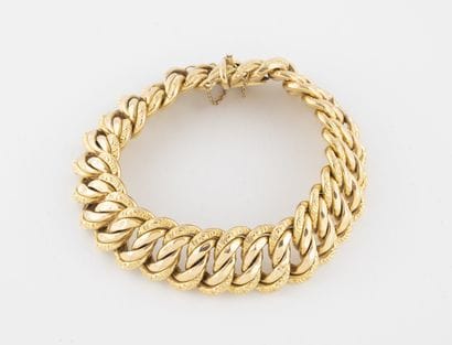 Bracelet en or jaune (750) à maille américaine.

Fermoir...