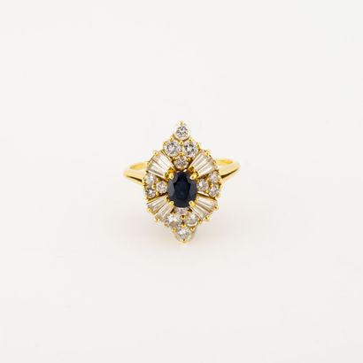 Yellow gold (750) marquise-shaped ring centered...