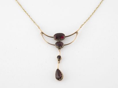 Yellow gold necklace (750) formed of a chain...