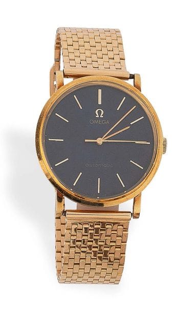 OMEGA
Yellow gold (750) wristwatch for men.
Round...