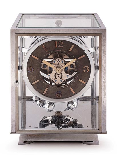 ATMOS
Chromed metal cage clock.
Signed silvered...