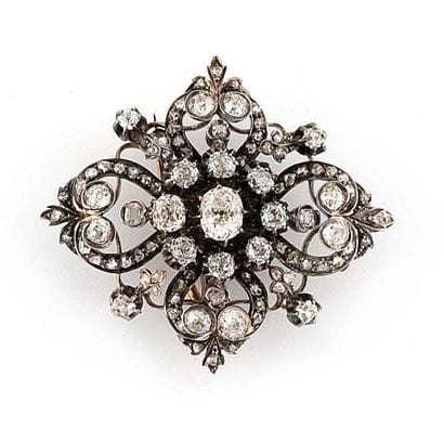 
Yellow gold (750) and silver (925) brooch...