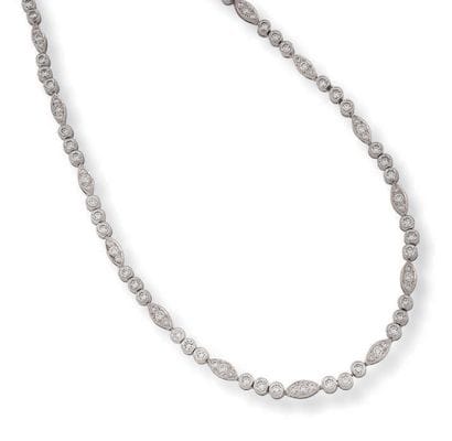 CARTIER
Articulated necklace in platinum...