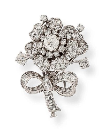 Lapel clip in platinum (850) and white gold...