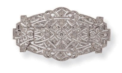 Platinum (850) plate brooch with openwork...