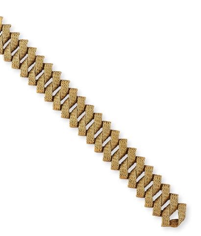 Elegant ribbon bracelet in yellow gold (750)...