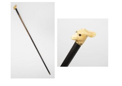 Cane with a donkey's head motif.

Cane in...
