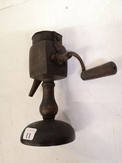Spice mill, called elephant trunk, in stained...