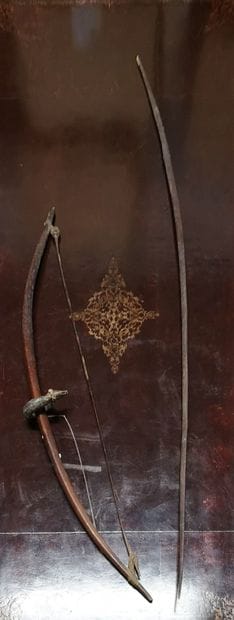 ARMES PRIMITIVES
Three wooden bows, one with...
