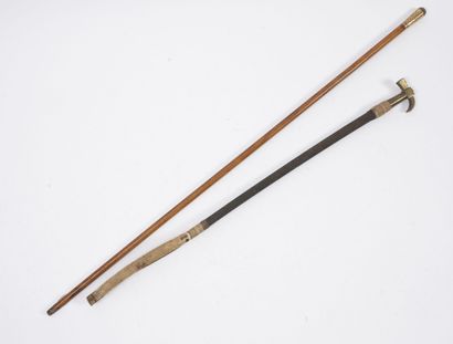 Rider's whip sheathed in black braid, with...
