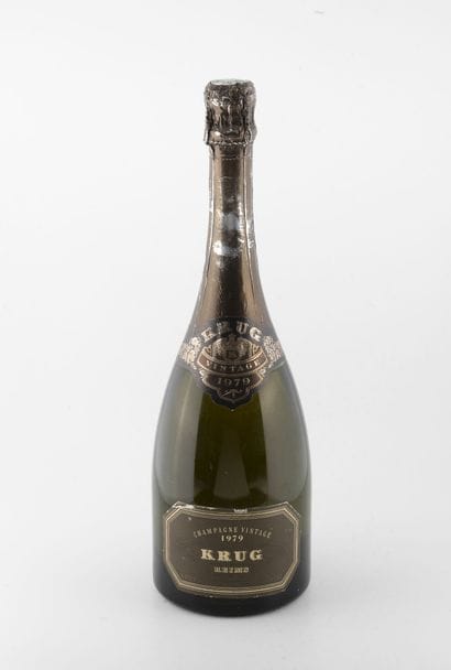 KRUG
1 vintage bottle, 1979.

Low level.

Wear,...