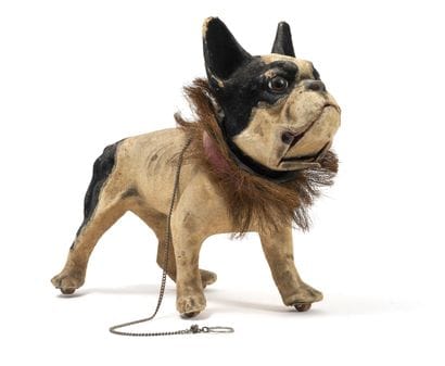 Automaton toy

In boiled cardboard featuring...