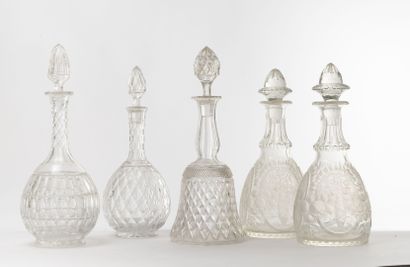 Pair of carafes and stoppers.

In cut glass.

H....