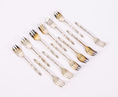 ERCUIS
Series of twelve silver plated cake...