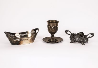 Four pieces of metal or silver-plated metal...