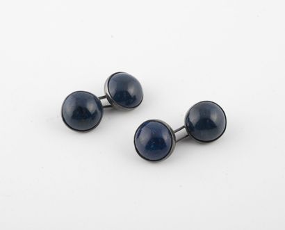 Paire de boutons de manchettes en argent...